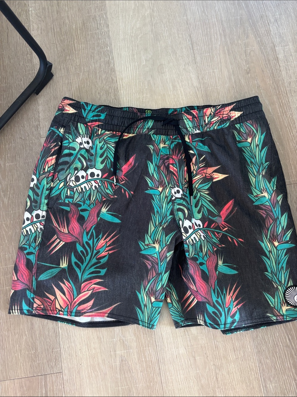 Volcom Black Swim Trunks with Teal & Coral Tropical Print